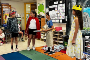  students performing a play